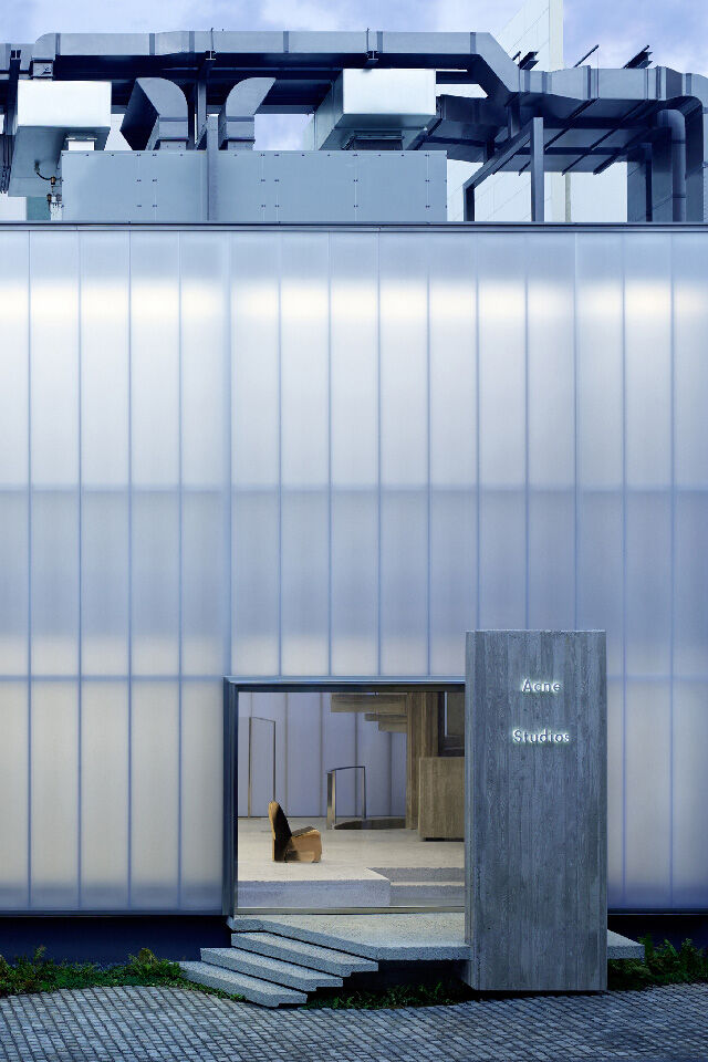 Exterior of the Acne Studios flagship store in South Korea, illustrating the option to order online and collect in store.