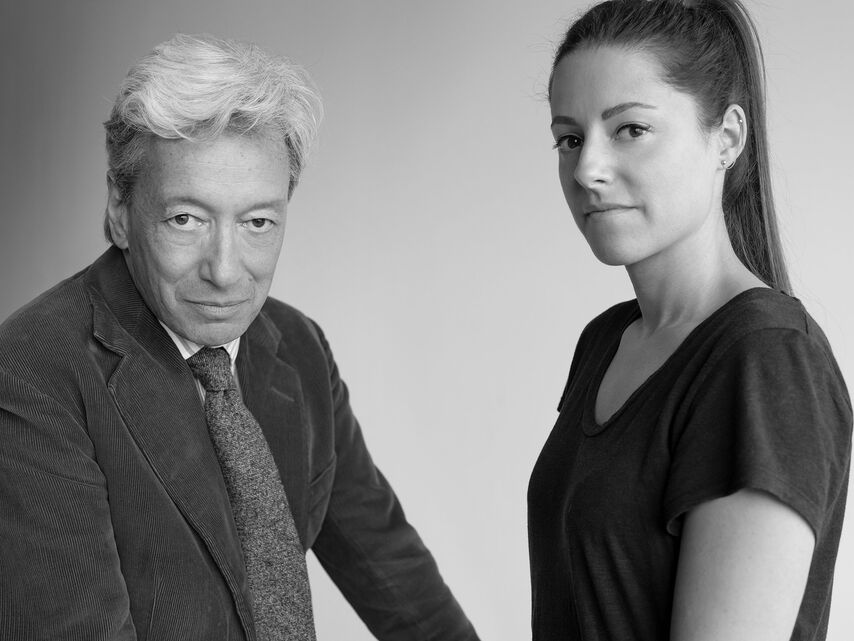 A black and white portrait of Frederic Malle and Suzy Le Helley