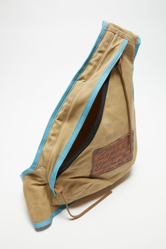 Acne Studios - Sling backpack - Beige/blue