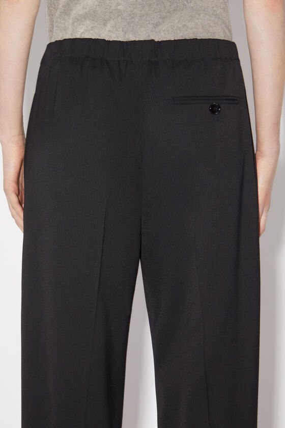 Acne Studios - Tailored herringbone trousers - Black