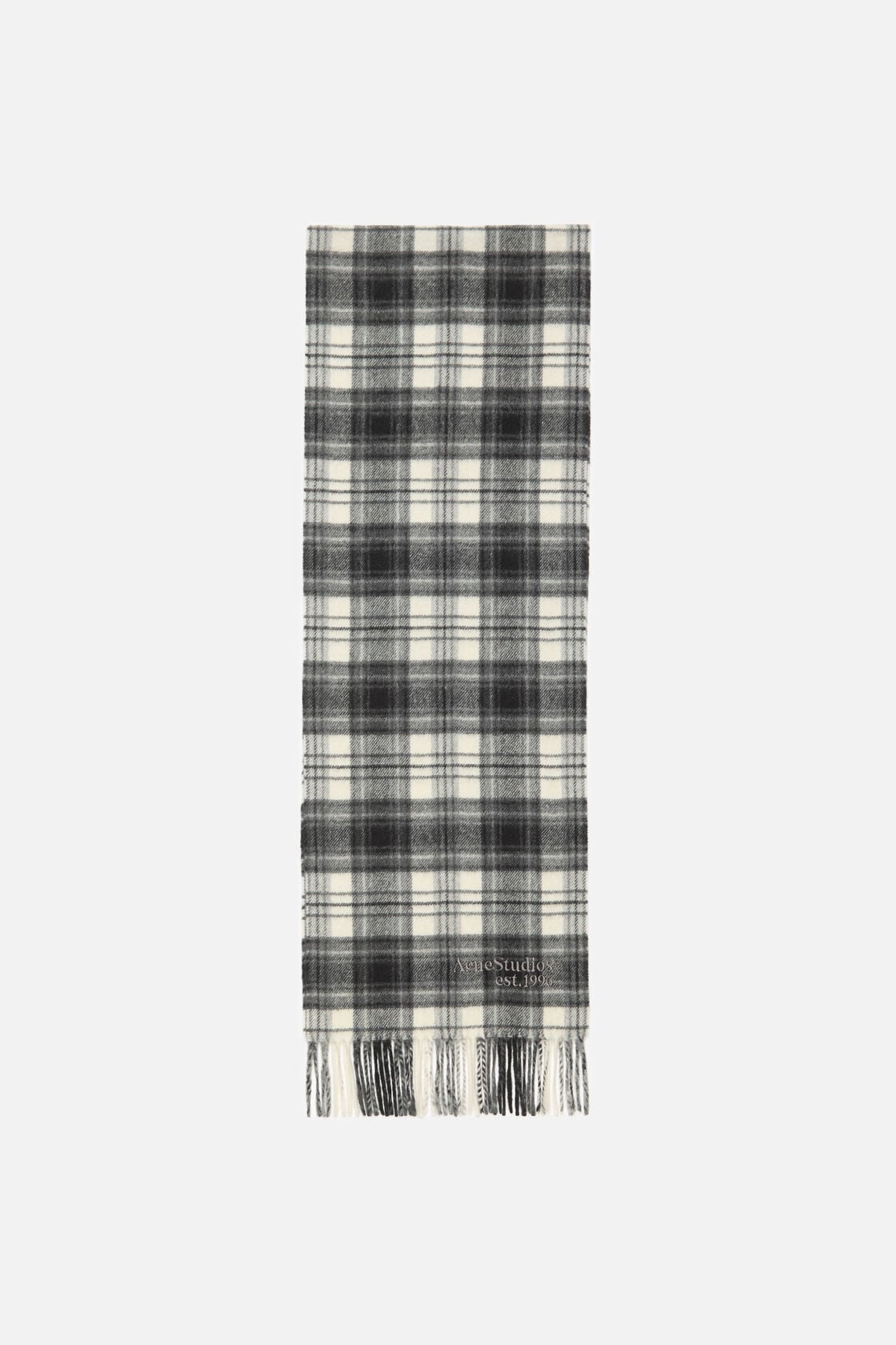 Acne Studios black and white cashmere scarf with plaid check pattern, fringed ends, and embroidered logo detail.
