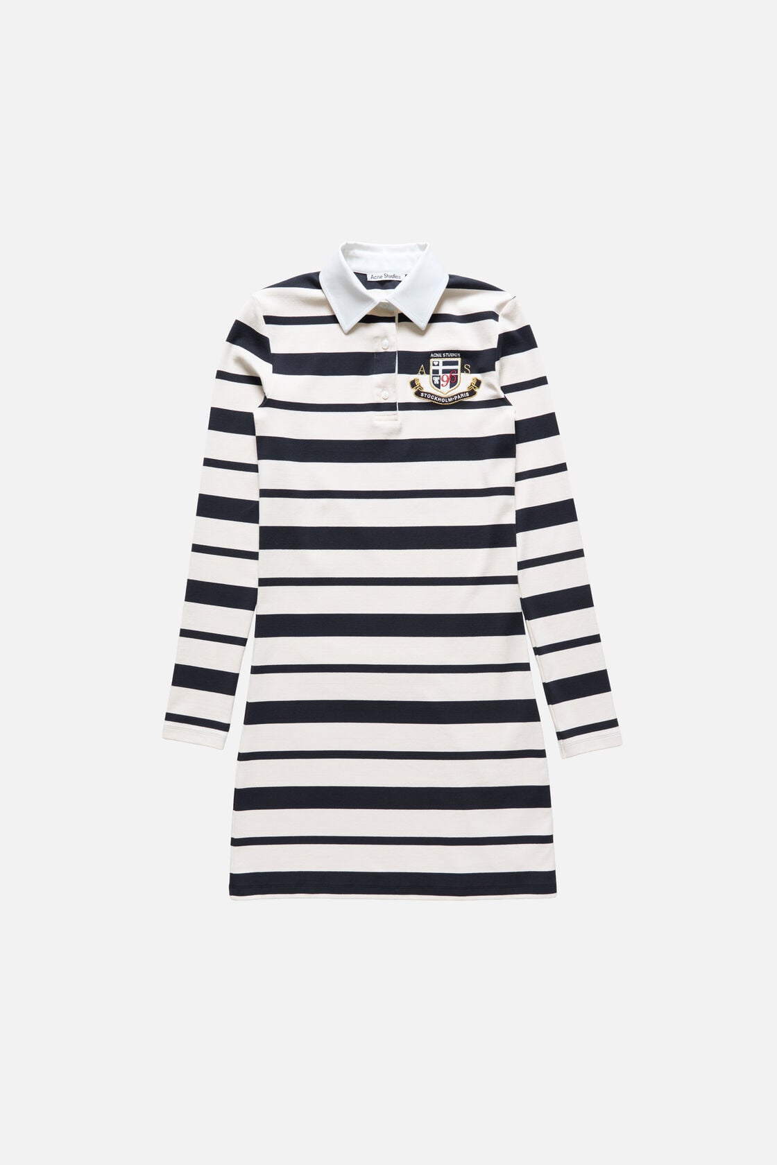 Acne Studios striped polo dress in navy and ecru, long sleeves, polo collar, button placket, embroidered crest logo at chest.