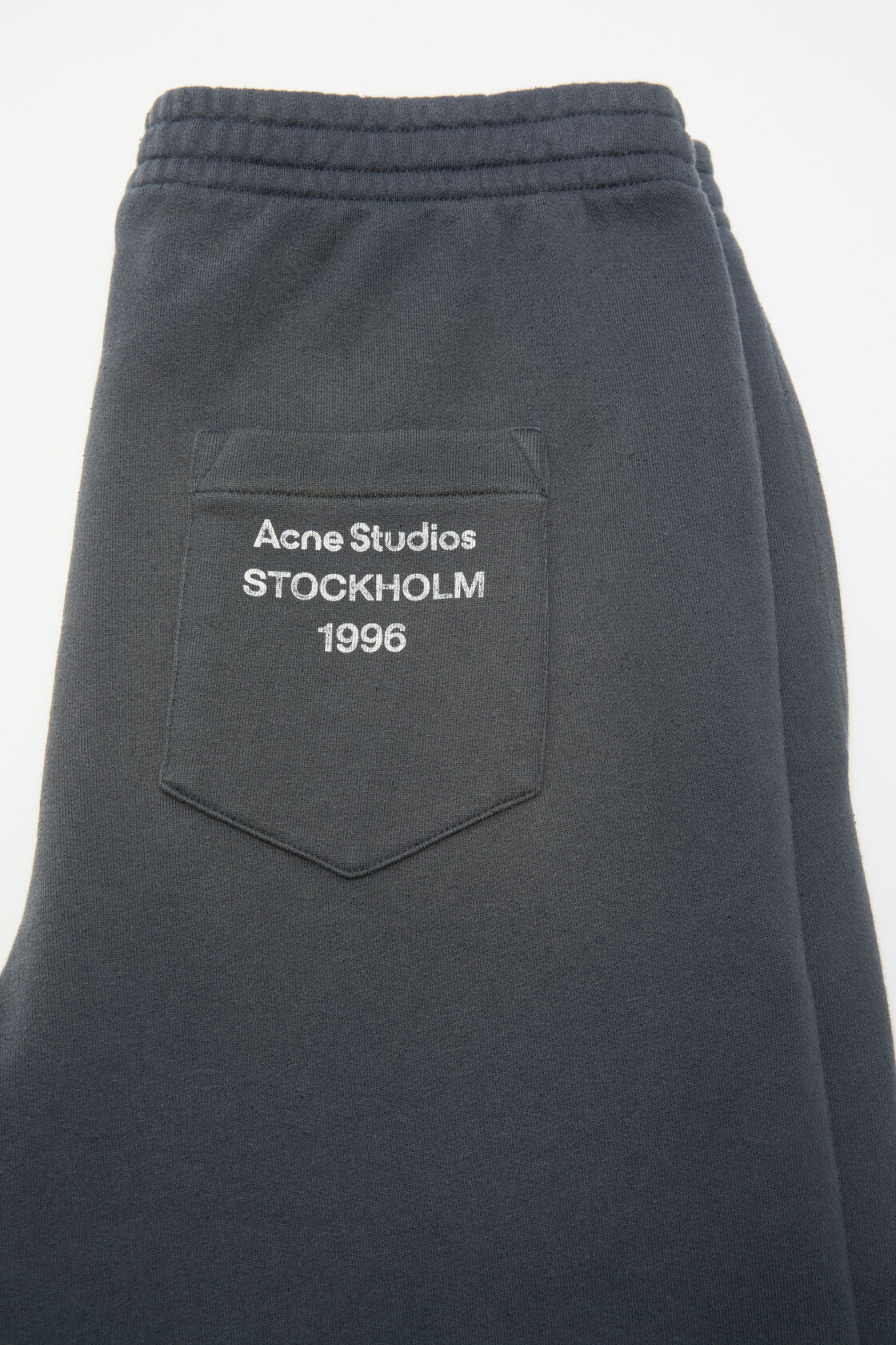 Fleece trousers with stamp logo, Faded black, 2000x