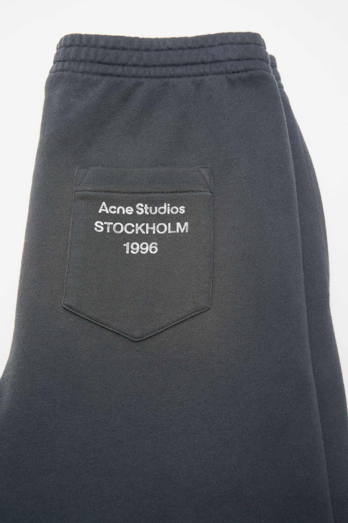 Fleece trousers with stamp logo, Faded black, 2000x
