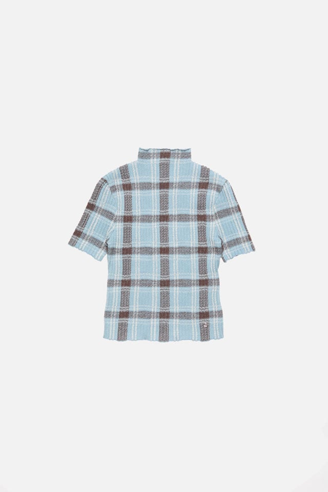 A showcase of the product of Acne Studios blue striped shirt.