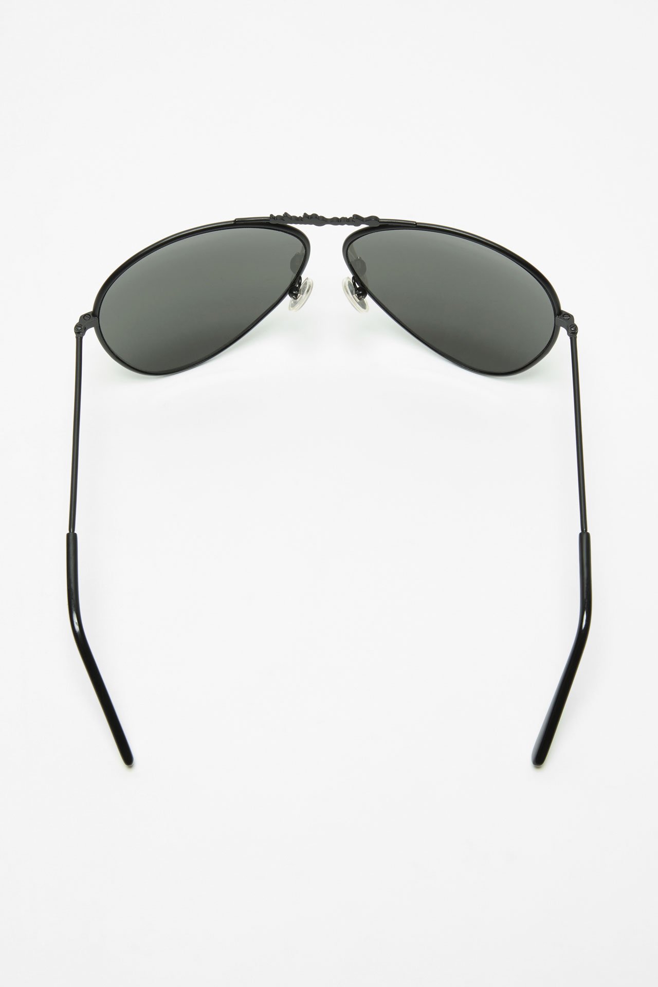 Acne Studios black pilot sunglasses.