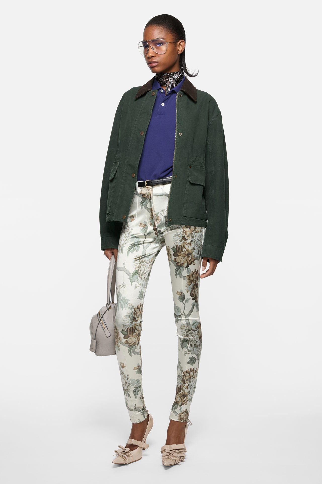 Acne Studios Womenswear beige checked shirt, brown tailored skirt-pants, brown suede Camero bag.