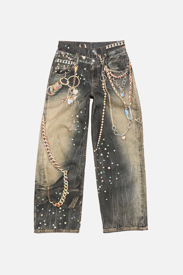 A showcase of the product of Acne Studios patterned grey jeans with lots of details.