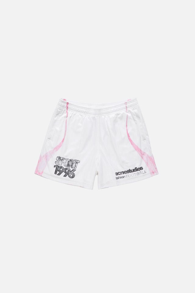 A showcase of the product: Acne Studios Football Capsule white-pink shorts.