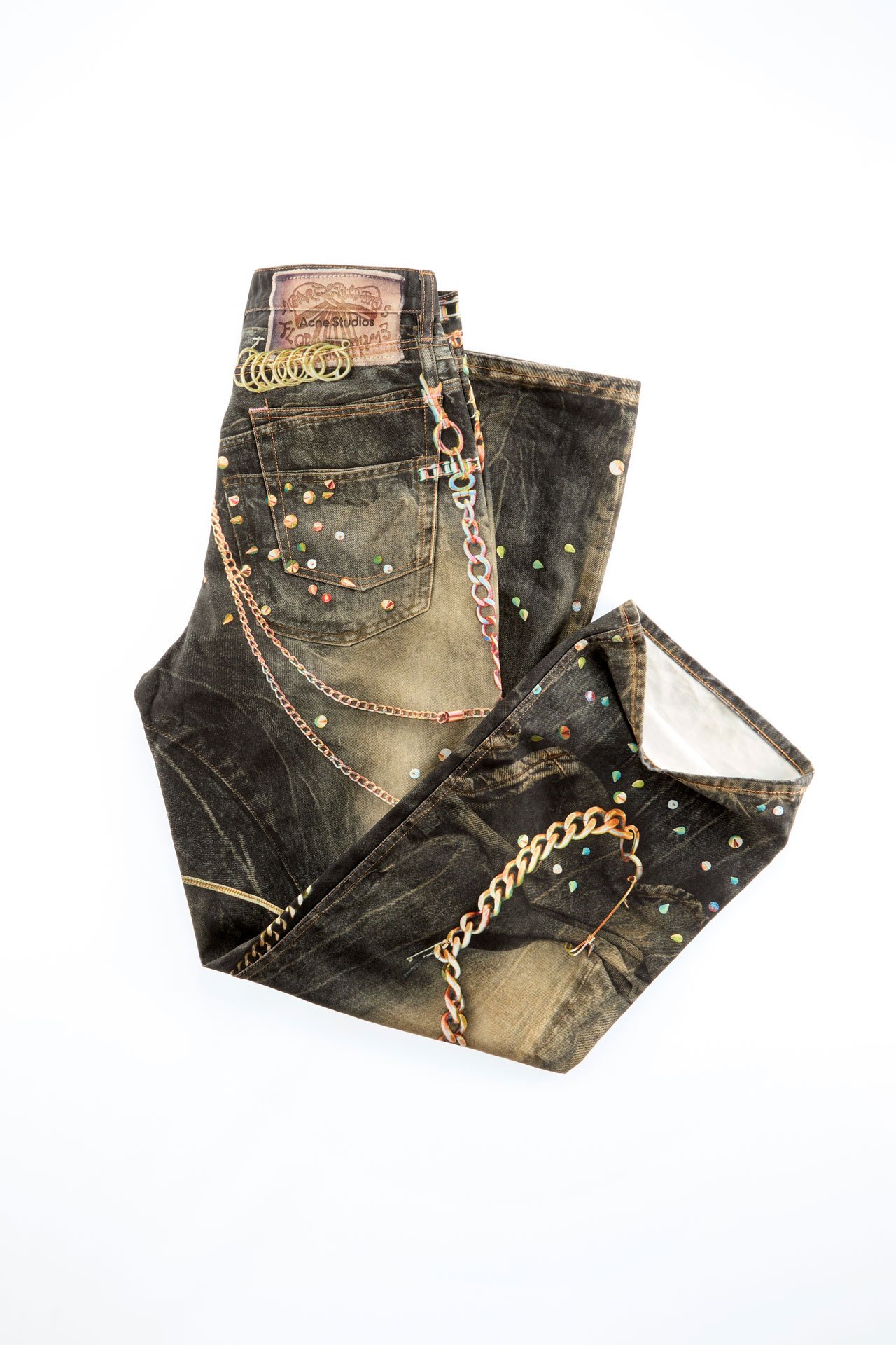 Acne Studios SS26 Year of the Horse grey-green TLO jeans folded in a creative way.