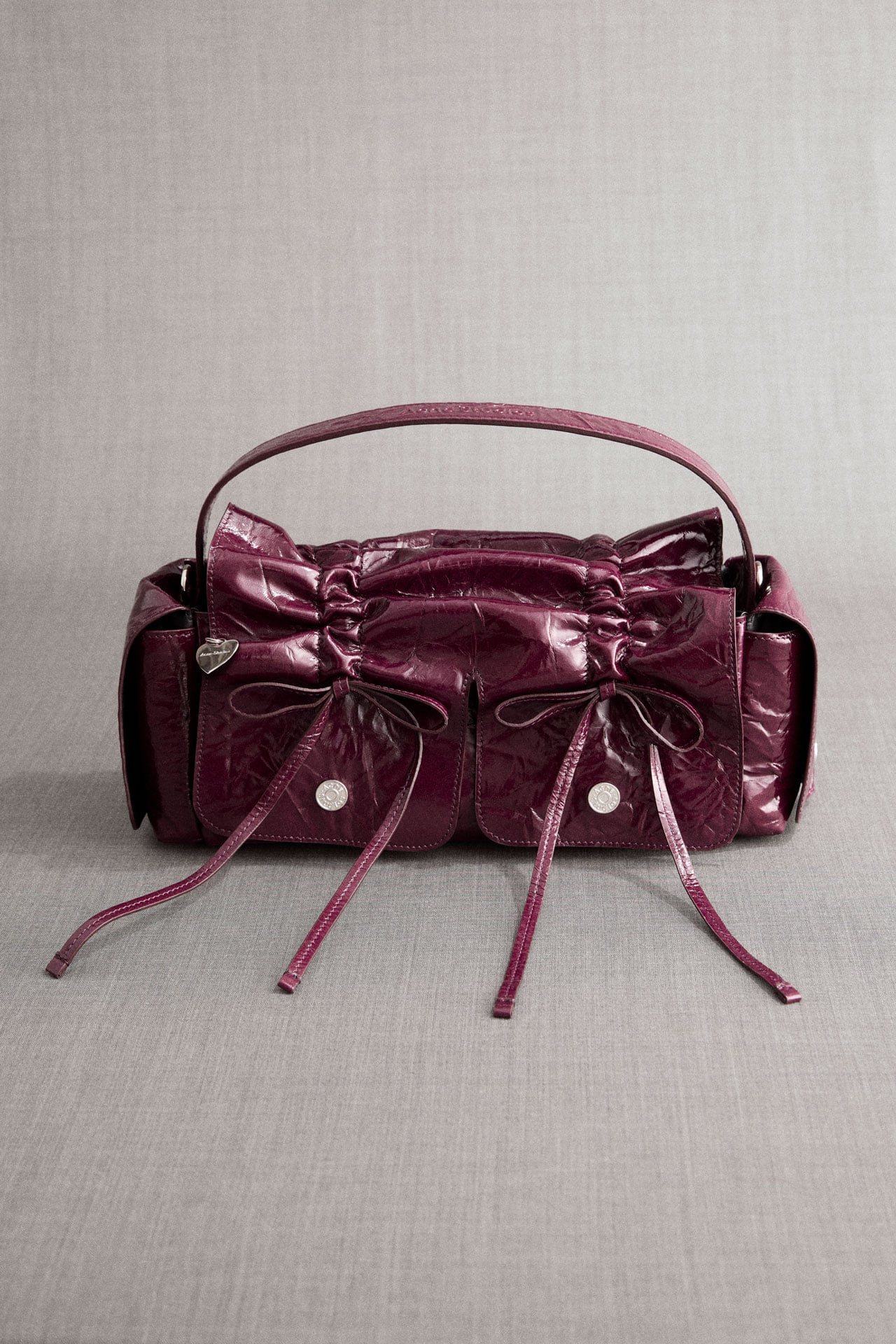 Acne Studios Multipocket berry pink leather bag.