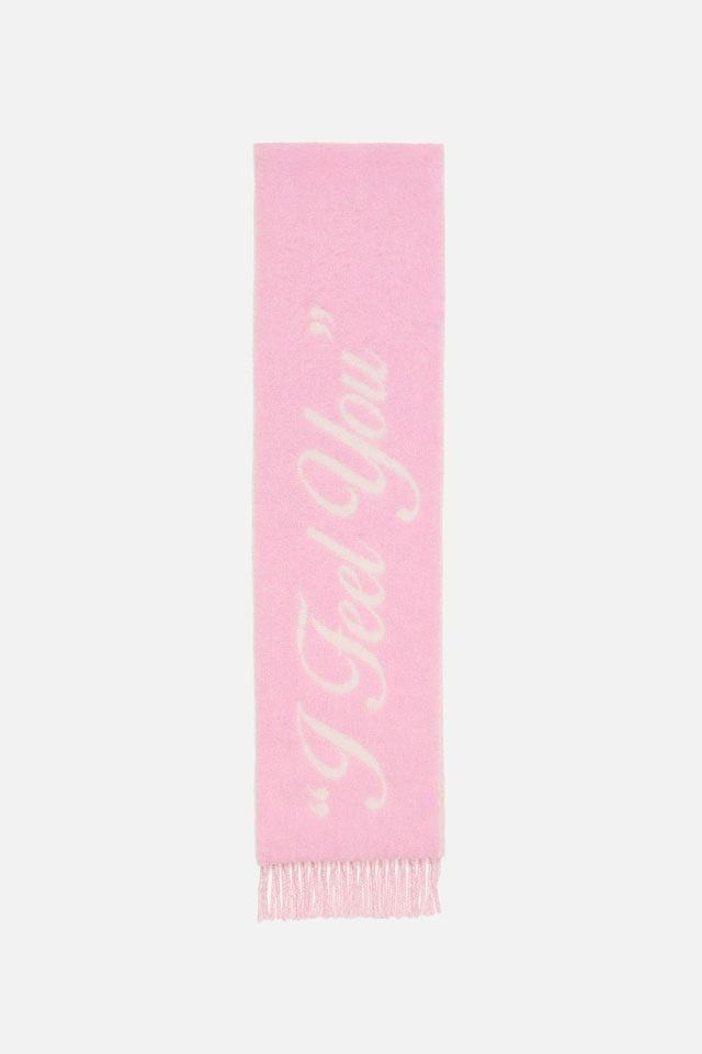 A showcase of Acne Studios Valentines Day collection pink scarf.