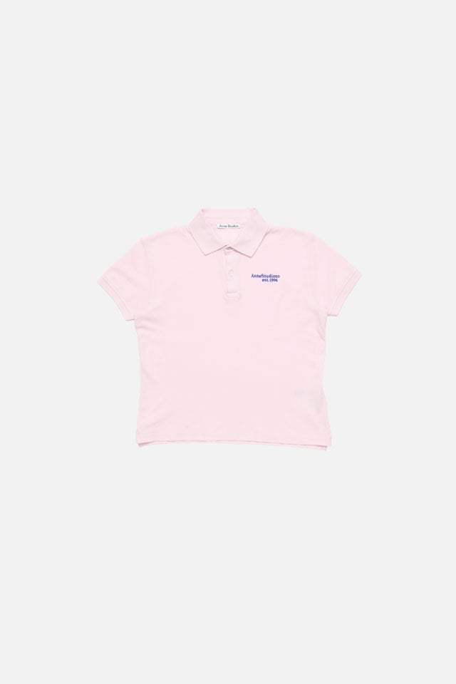 A showcase of the product: Acne Studios baby pink t-shirt.