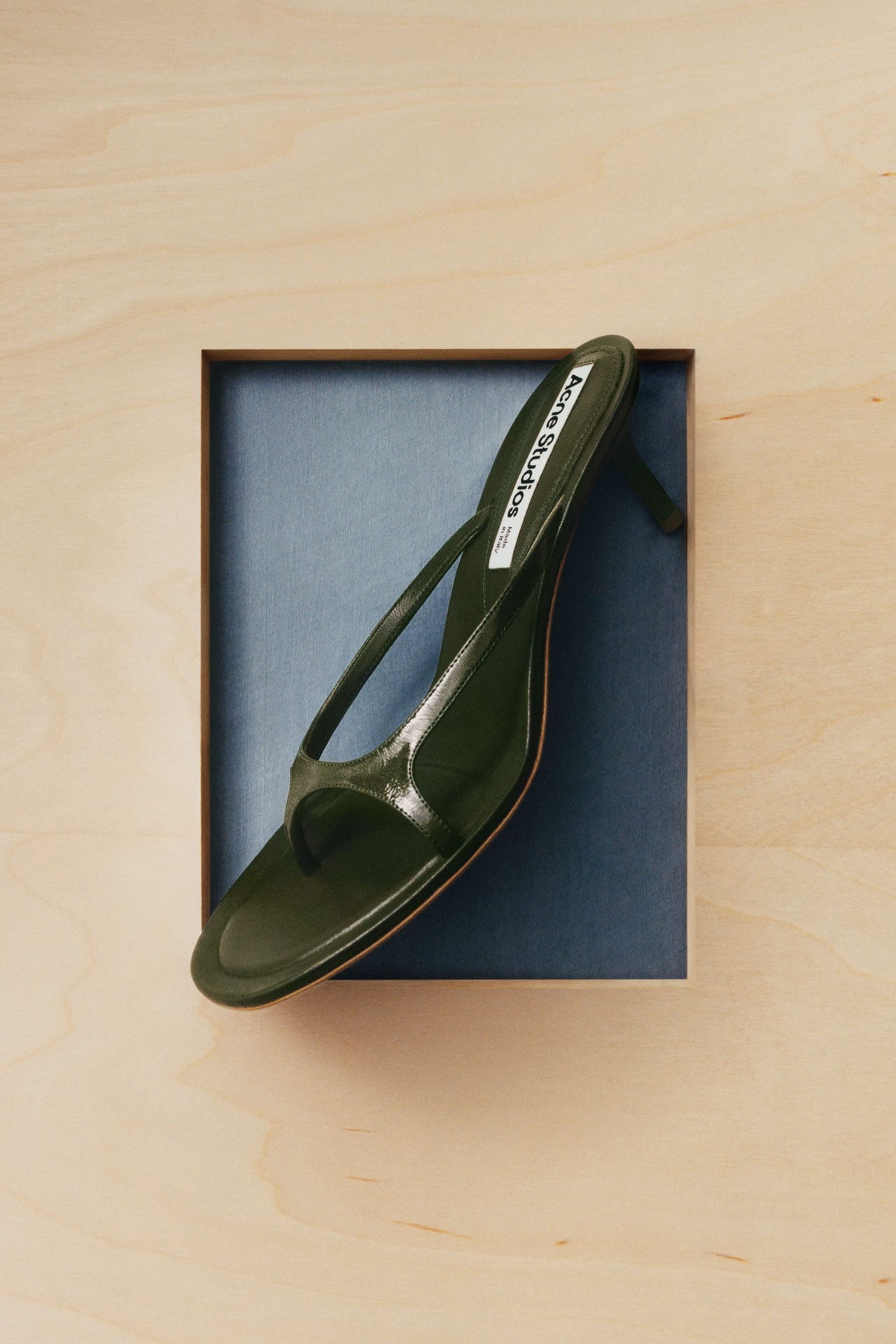 Acne Studios SS26 Summer Collection forest green leather kitten heels.