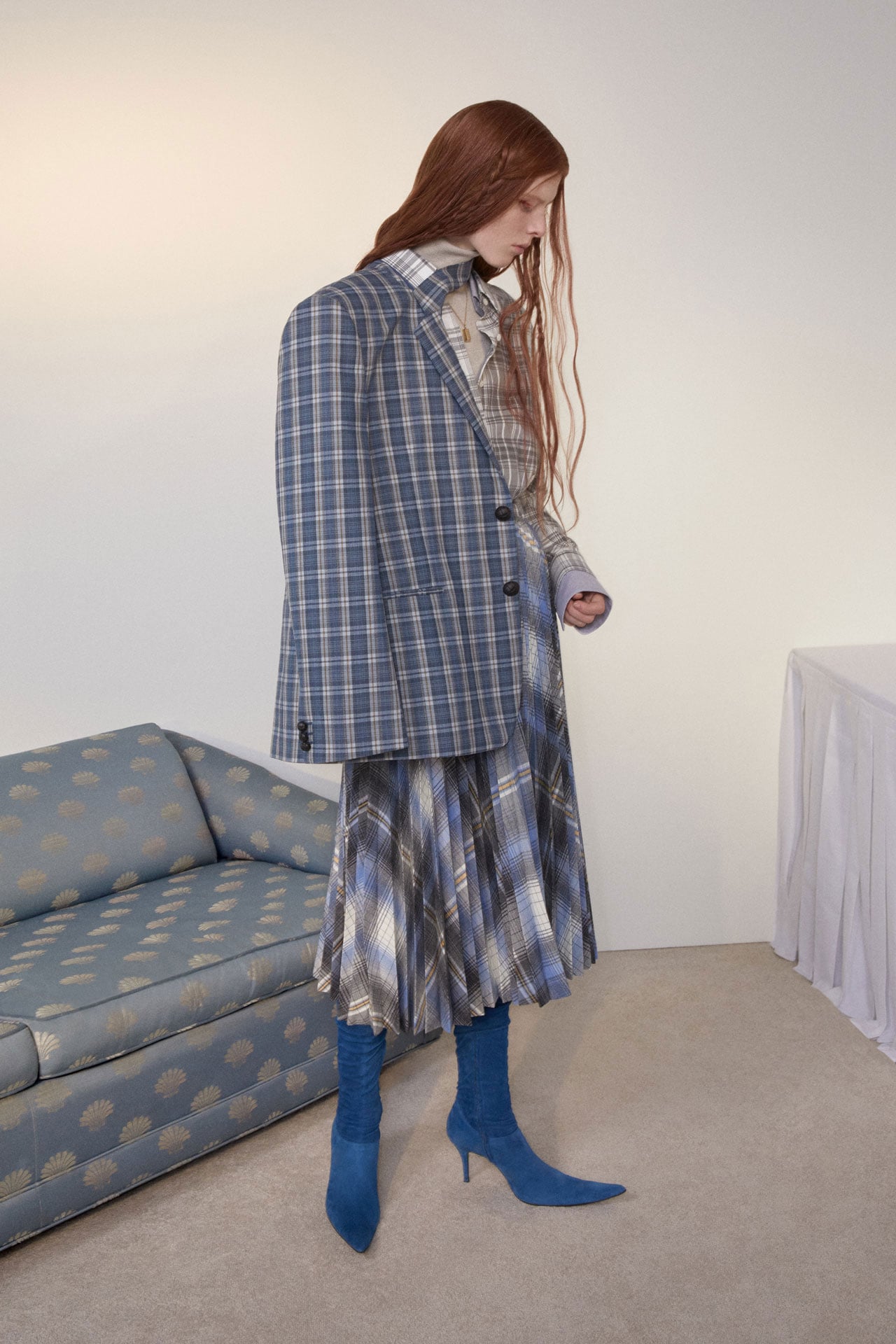 Acne Studios Womenswear FW26 Show Collection checked outfit with blue suede boots.