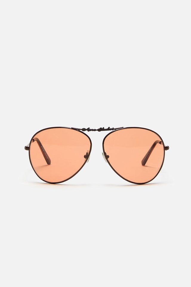 A showcase of the product: Acne Studios sunglasses.