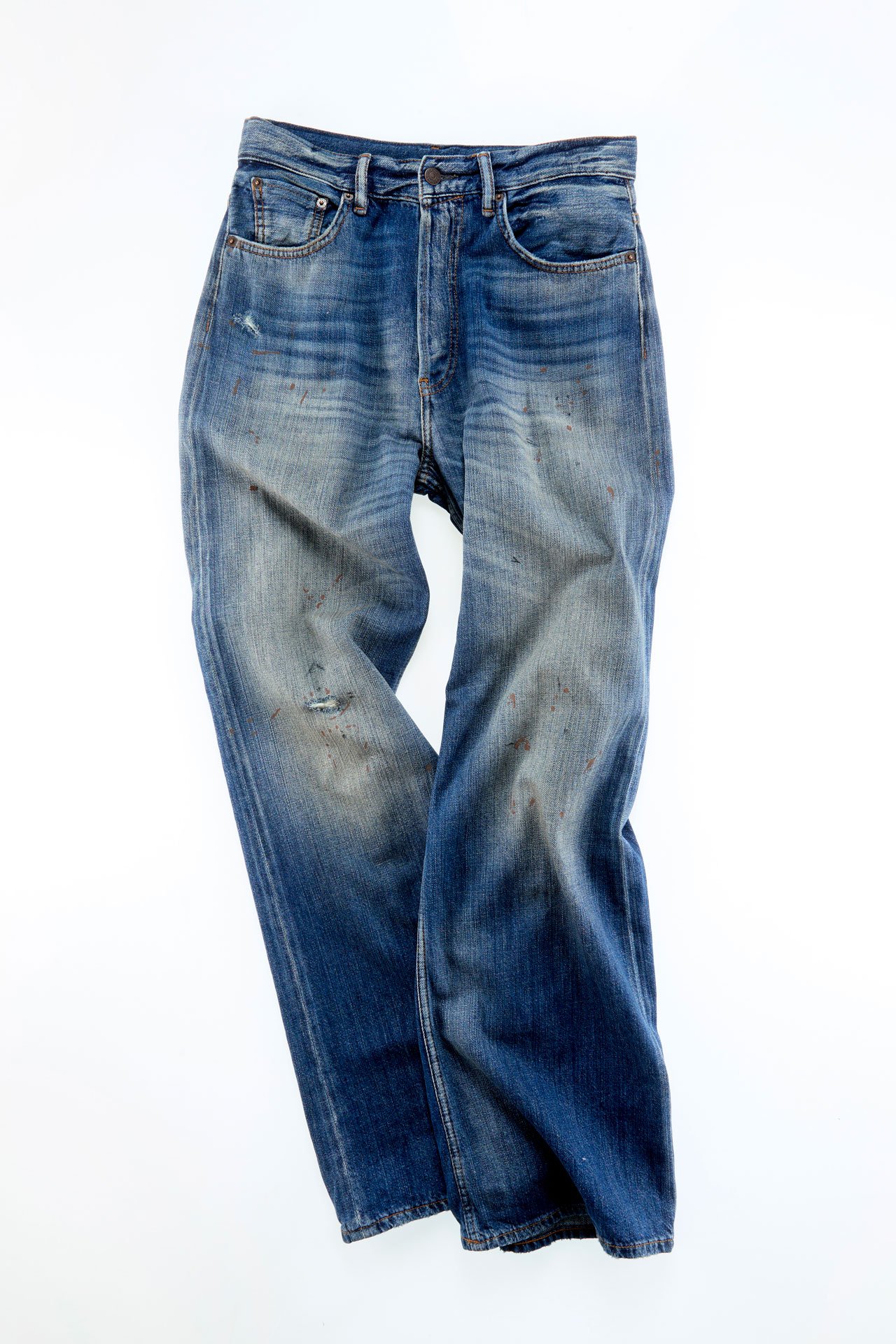 A creative showcase of a pair of Acne Studios blue jeans.