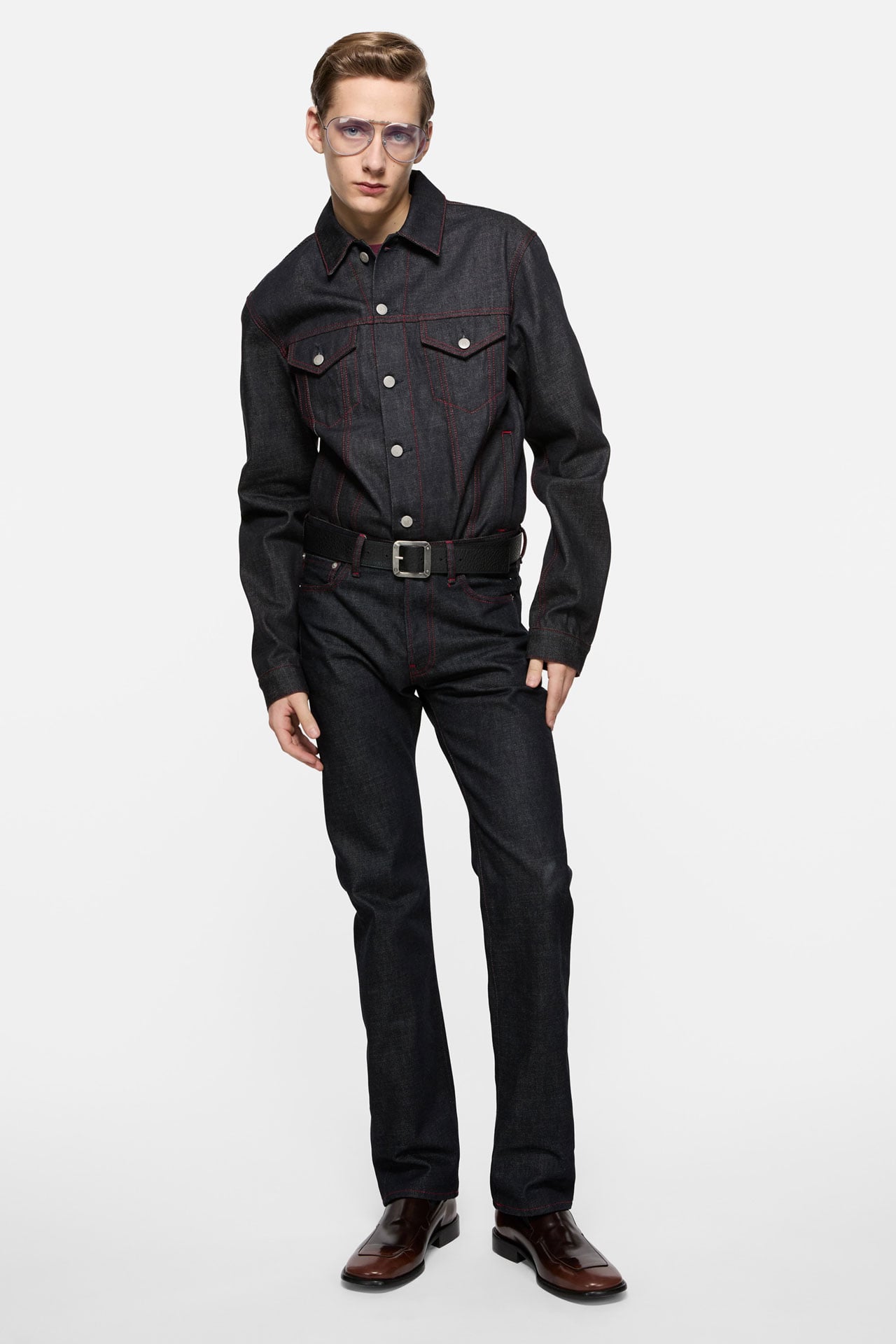 Acne Studios Menswear 30 Years collection dark denim jacket and matching jeans.