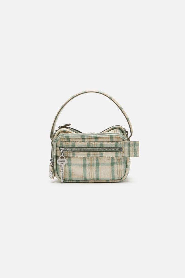 A showcase of the product: Acne Studios Camero kit check crossbody bag.