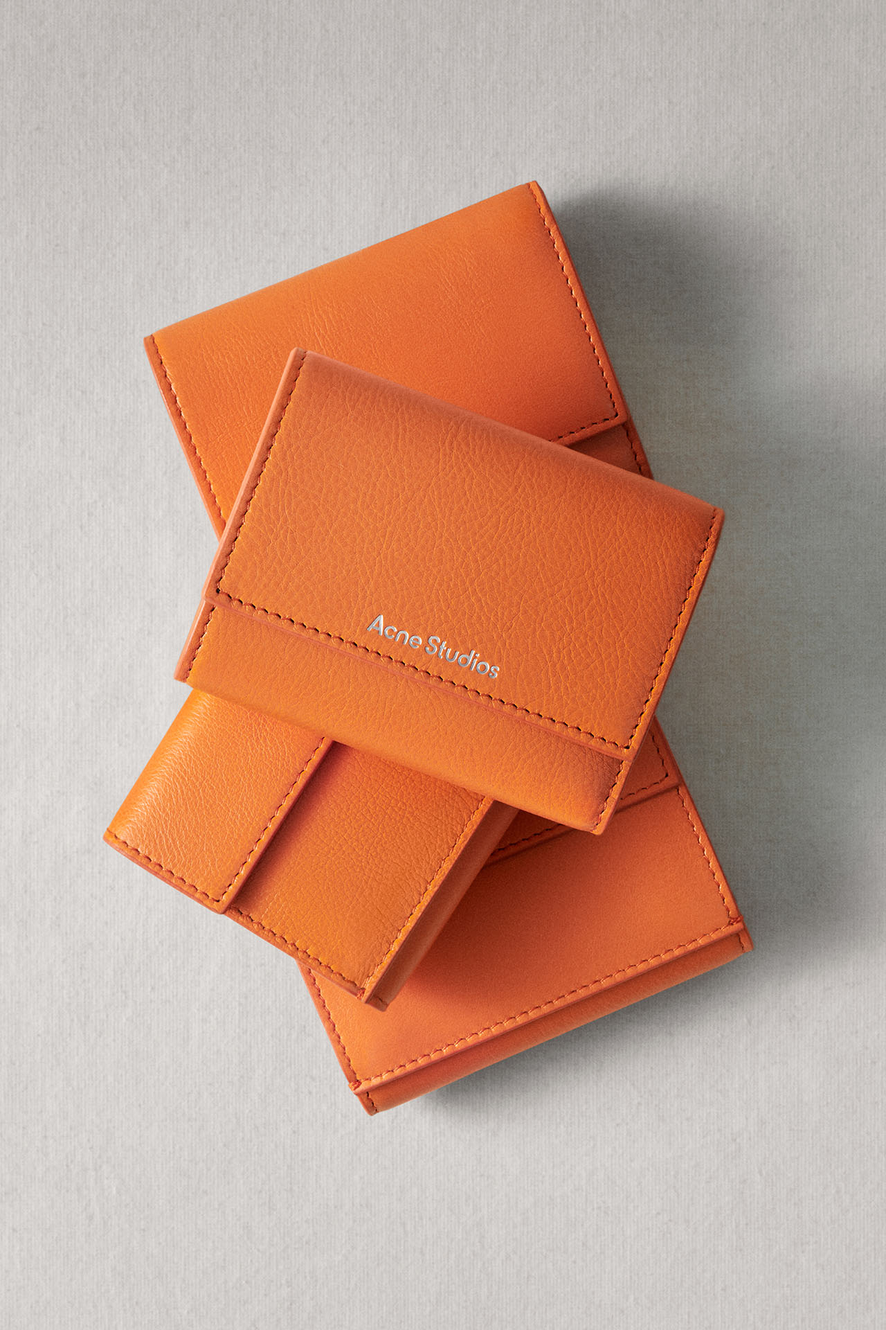 SS26 Japan Super Lucky Day orange leather small leather goods.