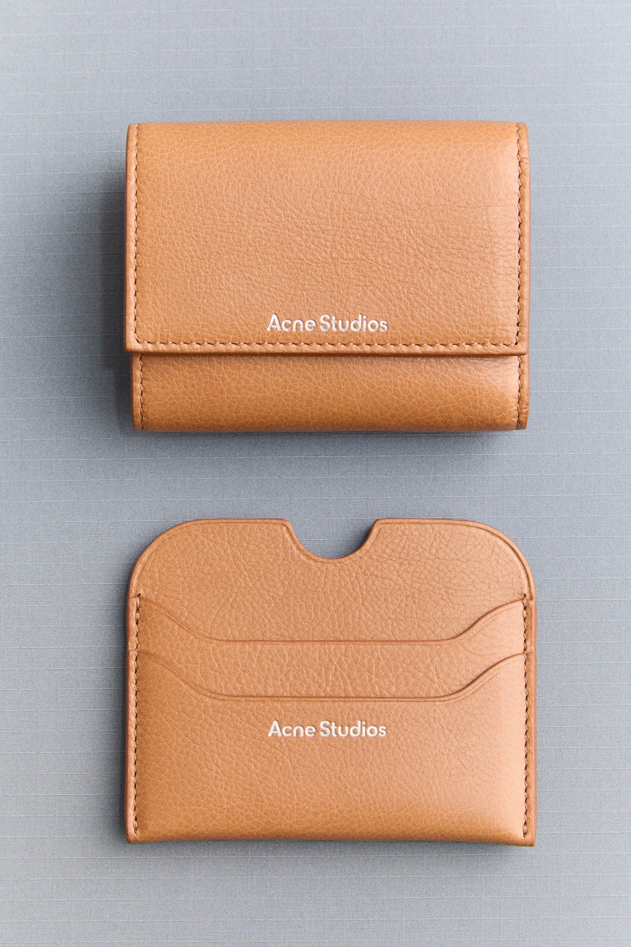 Acne Studios caramel brown leather small leather goods.