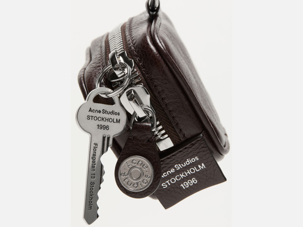 Product image of an Acne Studios brown leather mini Camero bag.