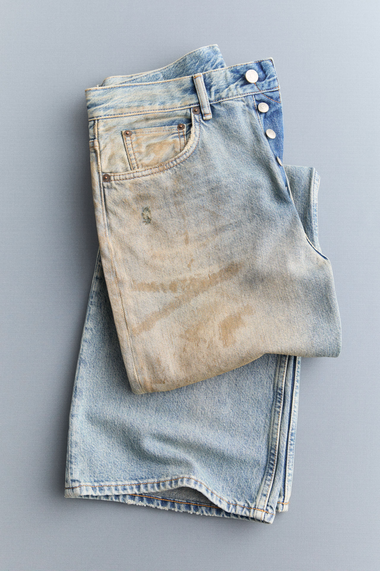 Acne Studios light blue jeans.