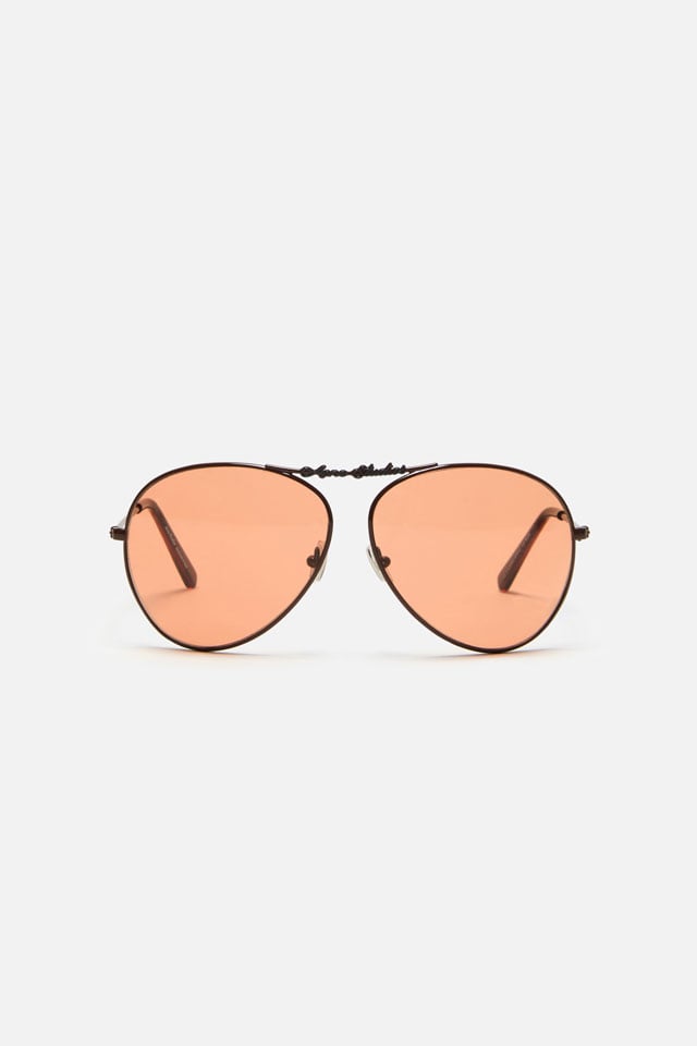 A showcase of the product: Acne Studios Aviator sunglasses.