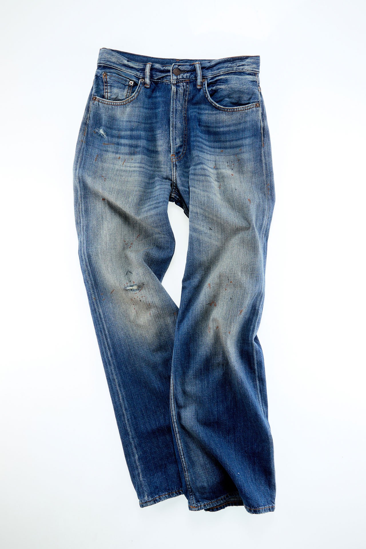 A creative showcase of a pair of Acne Studios blue jeans.