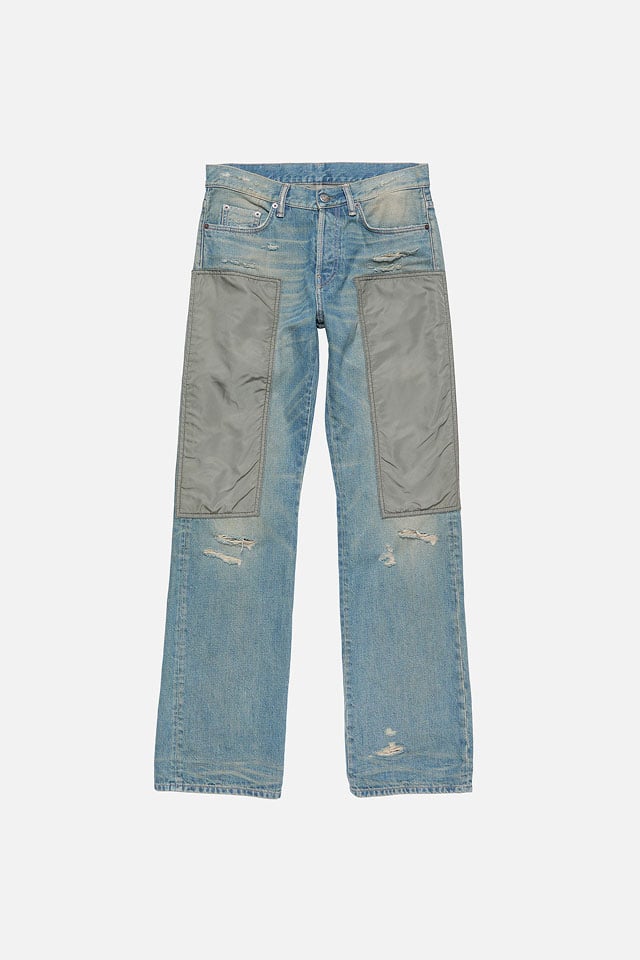 A showcase of the product of Acne Studios regular fit light blue jeans in the style 2010.