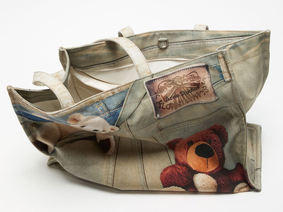 A close-up of the Acne Studios teddy shopper tote bag.
