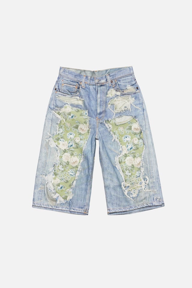 A showcase of the product: Acne Studios TLO denim shorts.