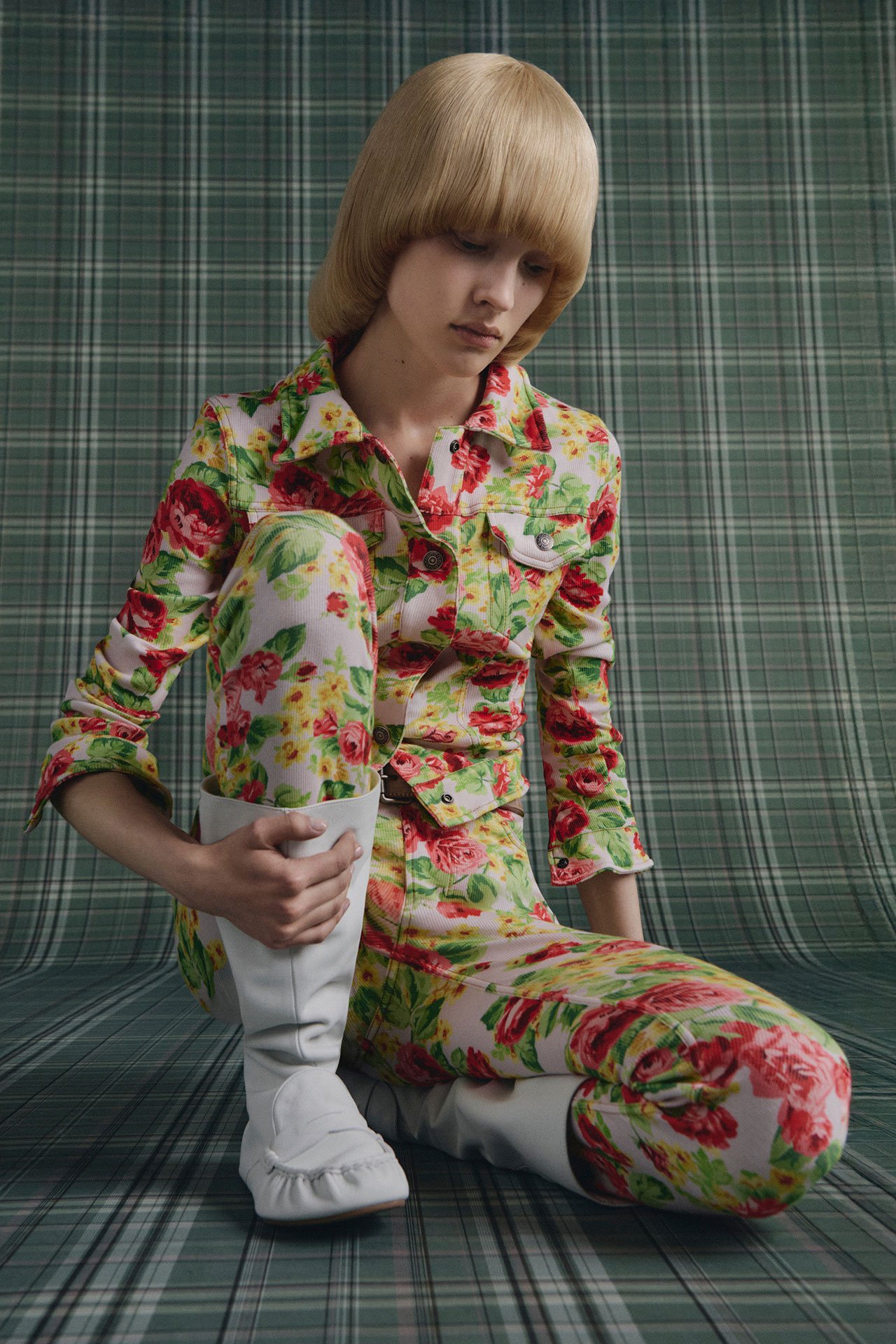 SS26 Acne Studios Womens New Arrivals - female model wearing bright flower-printed matching set with white leather boots.