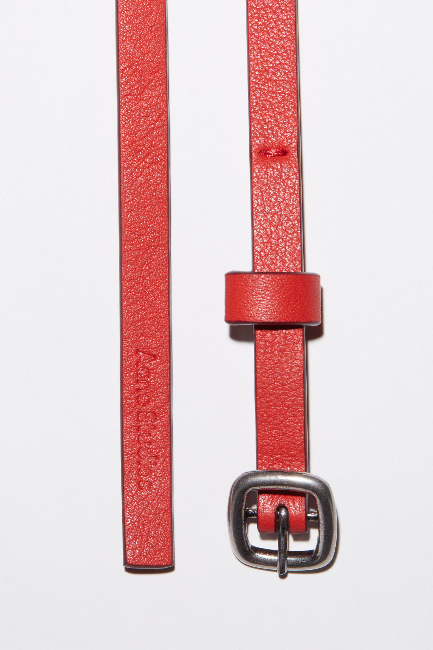 red thin belt