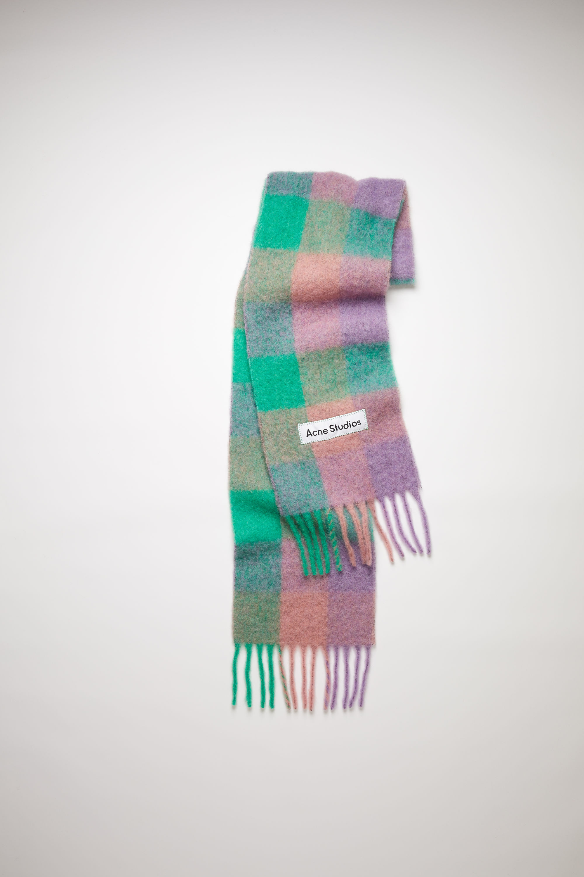 Acne Studios lilac purple/green/pink large scale check scarf is made of an alpaca blend with fringed ends. 001