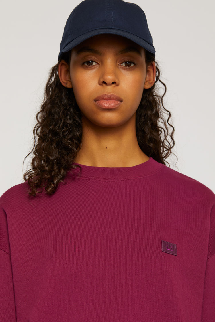 dark pink sweatshirt