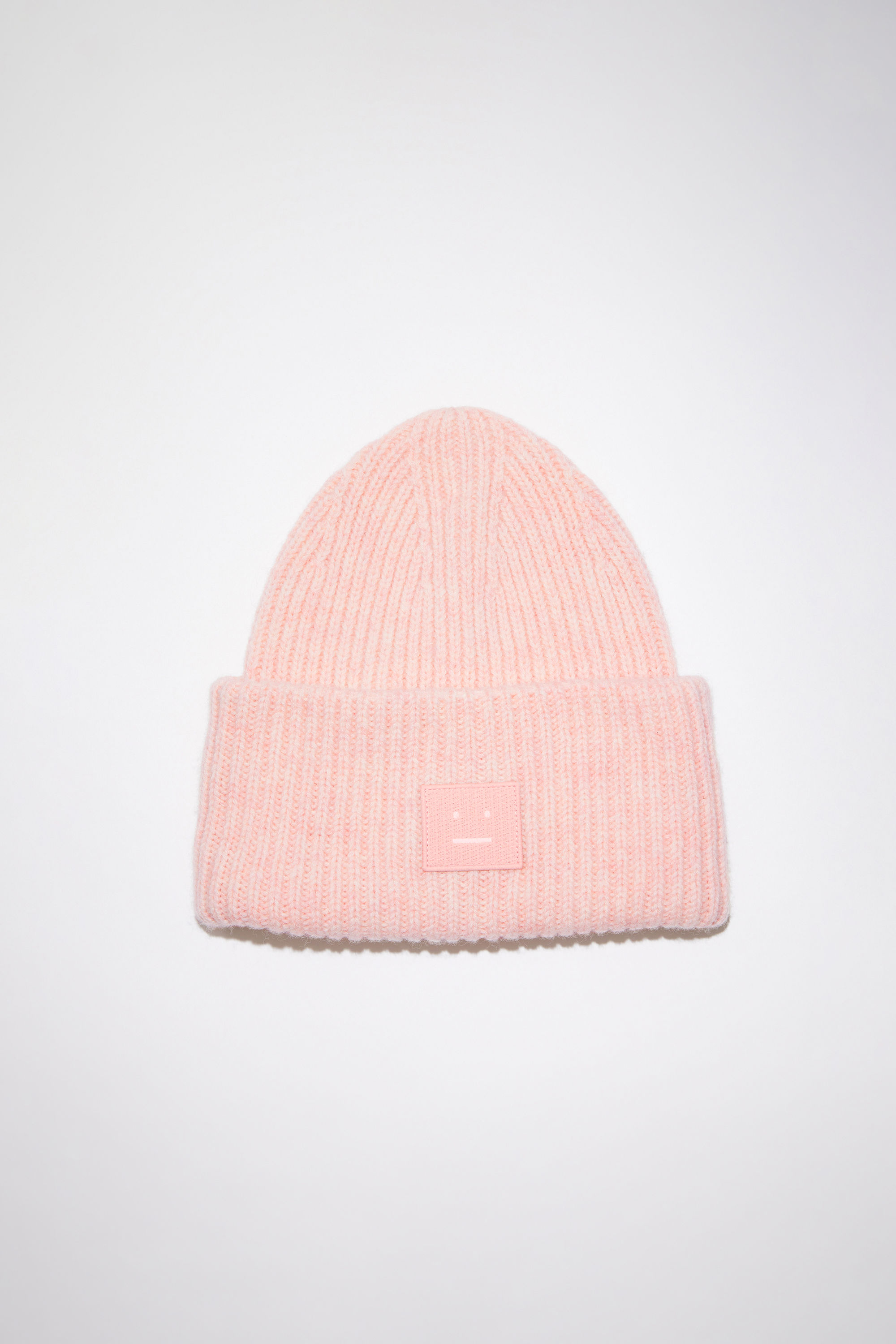 Acne Studios Large Face Logo Beanie In Faded Pink Melange