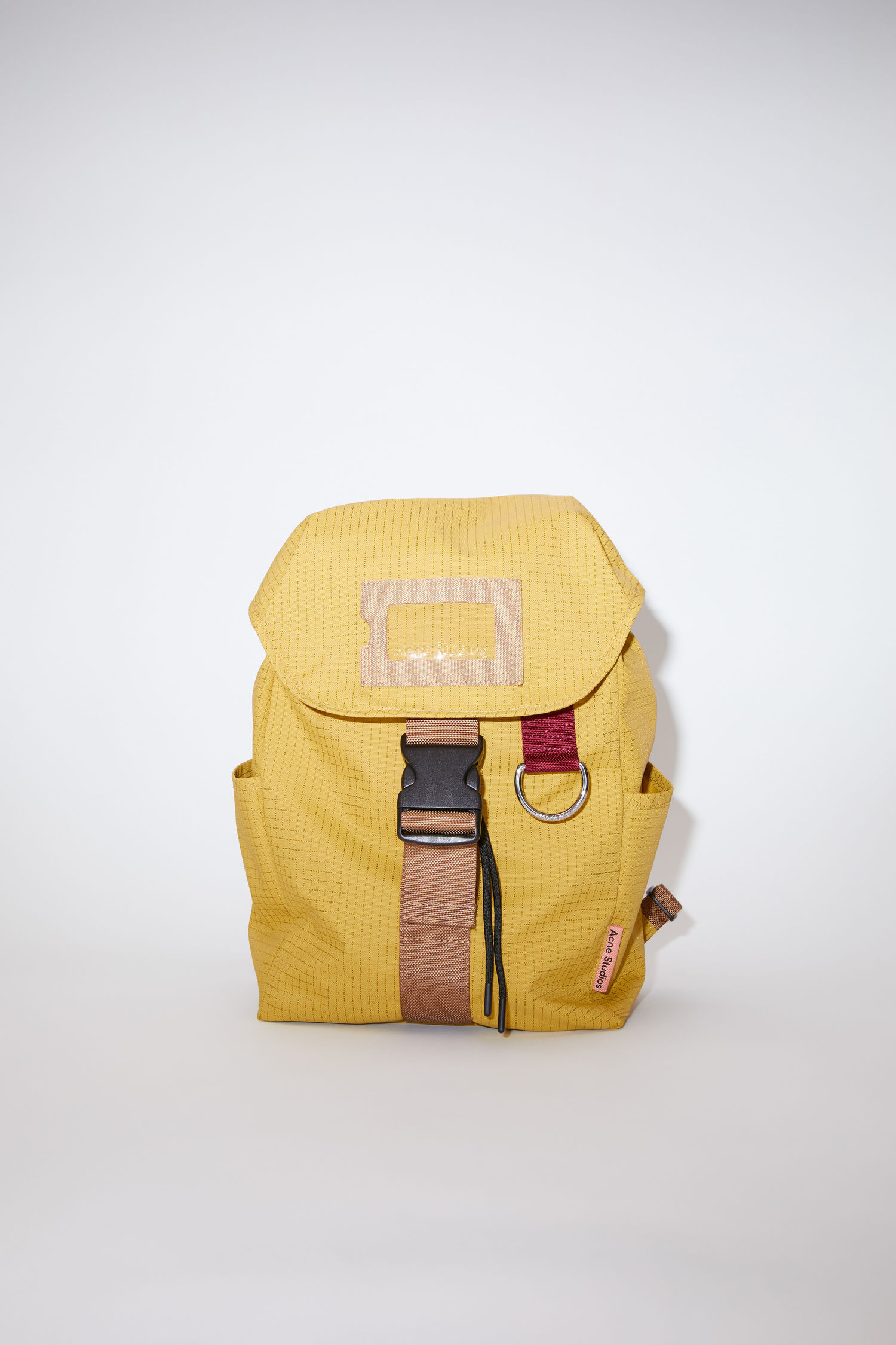 mustard colored backpack