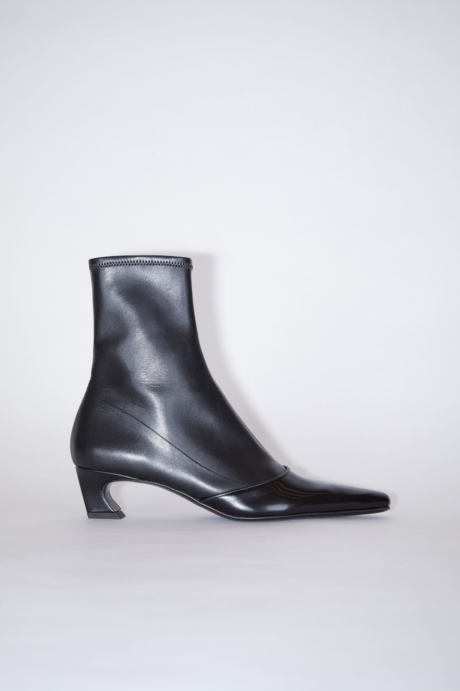 snakeskin ankle boots black