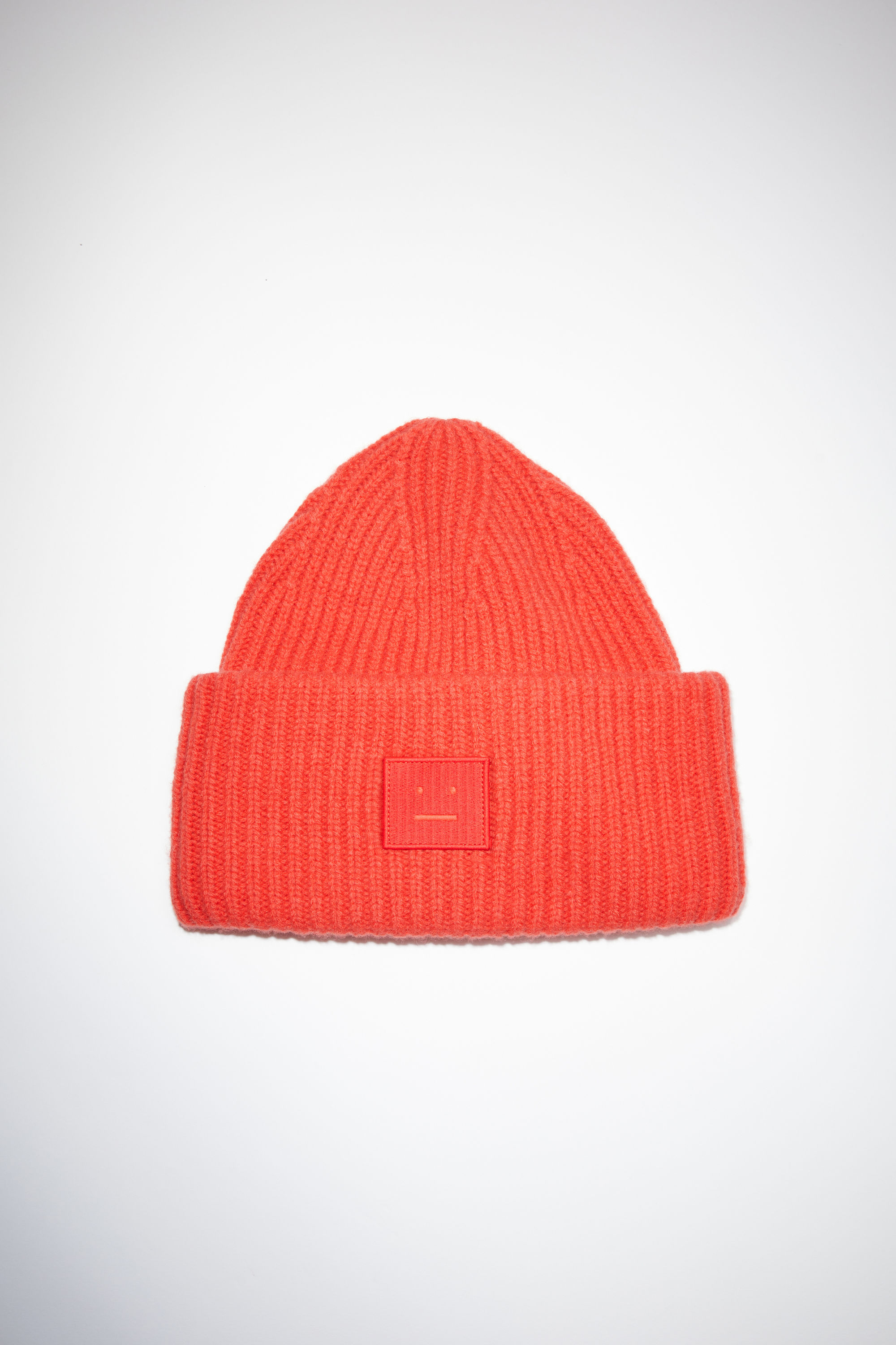 Acne Studios Large Face Logo Beanie In Sharp Red