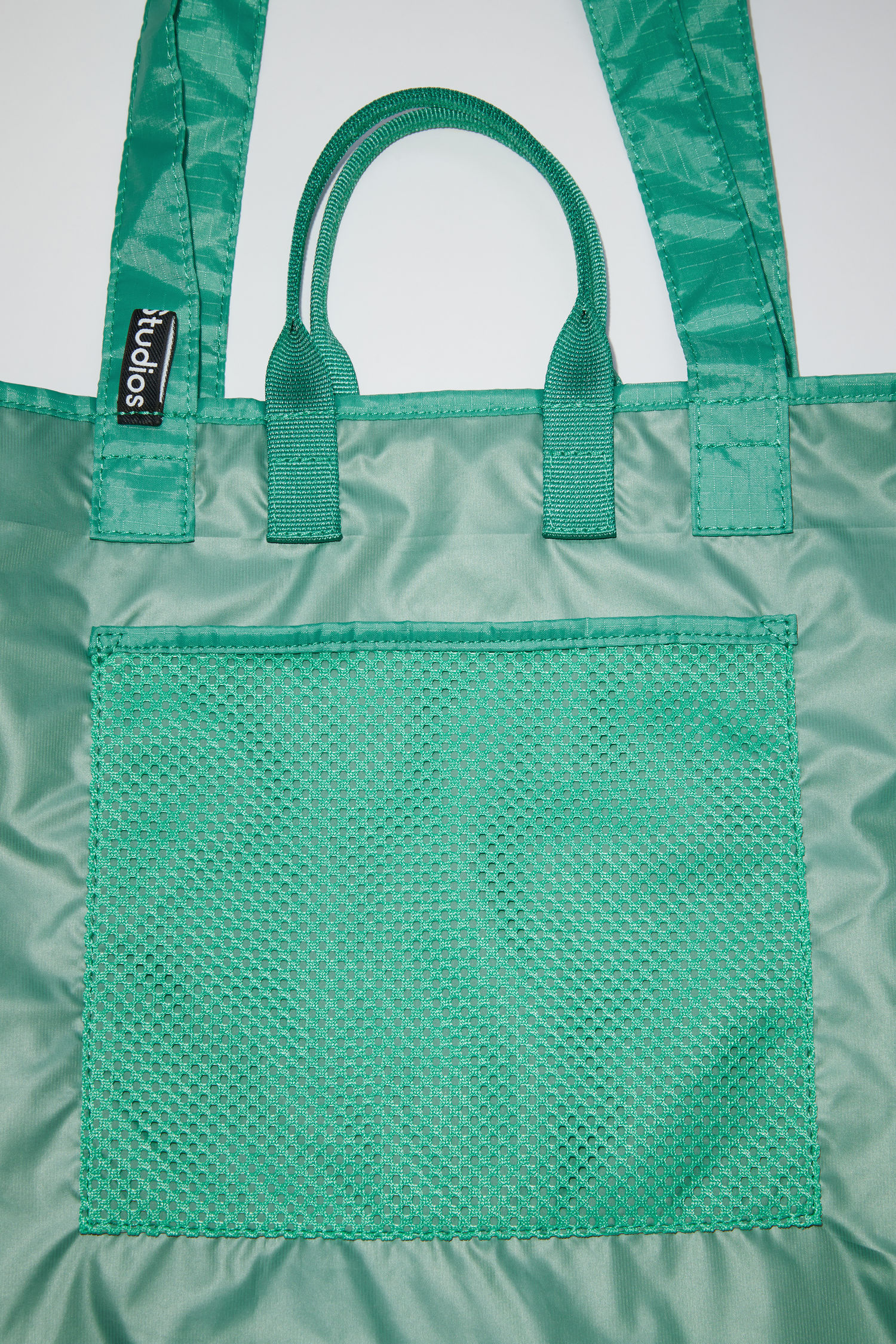 acne studios arvid plaque face tote bolsa